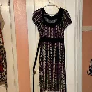 Purple, beige, and black dress